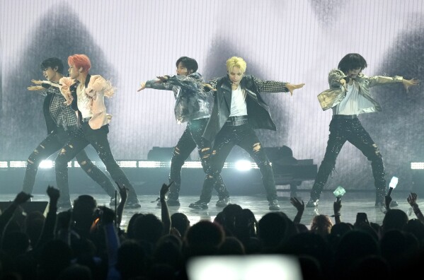 K-pop group TOMORROW X TOGETHER on their new album, working